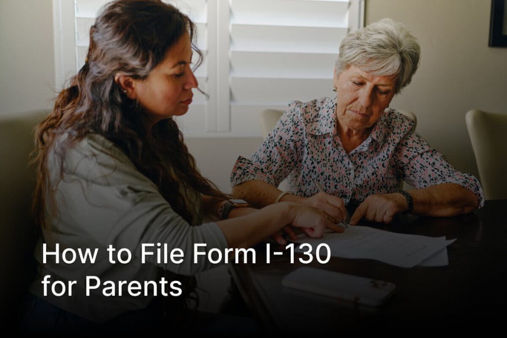 Adult child and parent reviewing Form I-130 petition paperwork together at home